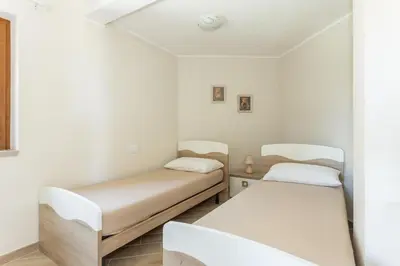 Letto o letti in una camera di Villetta Aires, Chia Seaview SouthSardiniaHoldays