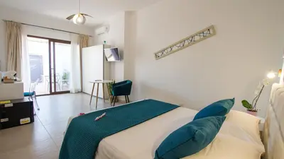 Letto o letti in una camera di B&B Jolie Suite