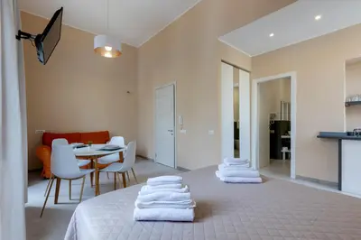 Letto o letti in una camera di Bonnystudios Holiday Apartments