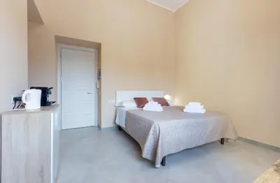 Letto o letti in una camera di Bonnystudios Holiday Apartments