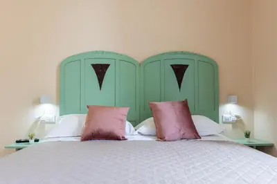 Letto o letti in una camera di Bonnystudios Holiday Apartments