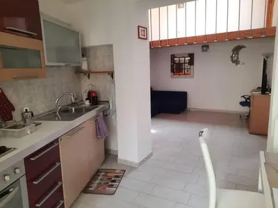 Cucina o angolo cottura di Stylish Loft Trivano Cagliari 2 beds/2 bath