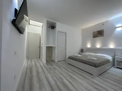 Letto o letti in una camera di CagliariParadiseApartment it Marina