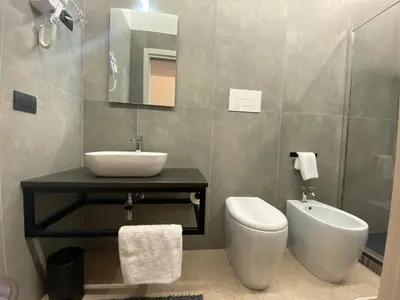 Bagno di affittacamere in centro MUSCI' ROOMS e SUITES