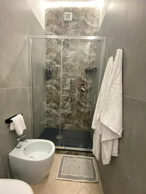 Bagno di affittacamere in centro MUSCI' ROOMS e SUITES