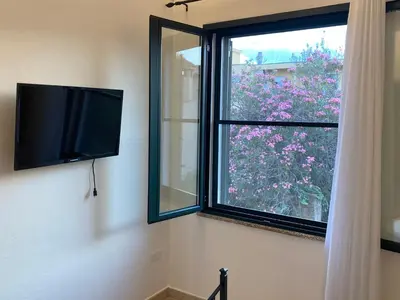 TV o dispositivi per l'intrattenimento presso affittacamere in centro MUSCI' ROOMS e SUITES