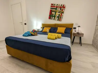 Letto o letti in una camera di Santeria Modern Loft