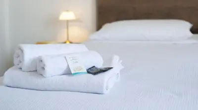 Letto o letti in una camera di Isola dei Racconti - Guesthouse - Apartment
