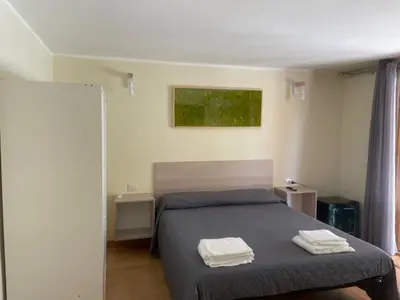 Letto o letti in una camera di VILLA ARYA
