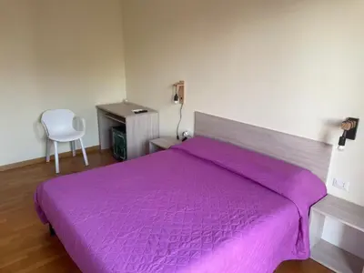 Letto o letti in una camera di VILLA ARYA