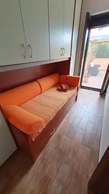 Letto o letti in una camera di Domus Mariposa