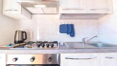 Cucina o angolo cottura di La Finestra Sul Mare-Sea stay