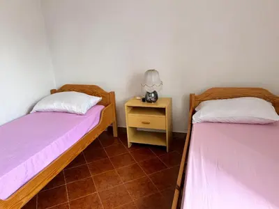 Letto o letti in una camera di Villaliana