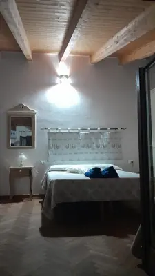 Letto o letti in una camera di B&B Nuovo Capo Altano