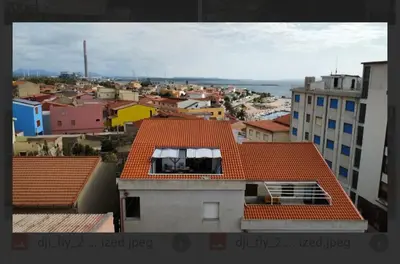 Vista generica su Portoscuso o vista sulla città dall'interno del bed & breakfast