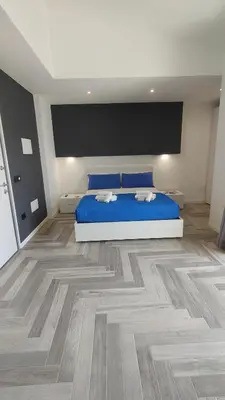 Letto o letti in una camera di Stanza idromassaggio 1