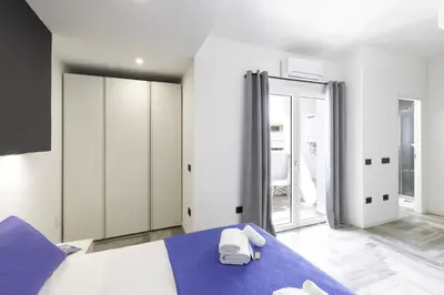 Letto o letti in una camera di Stanza idromassaggio 1