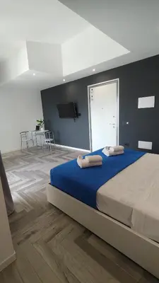 Letto o letti in una camera di Stanza idromassaggio 1