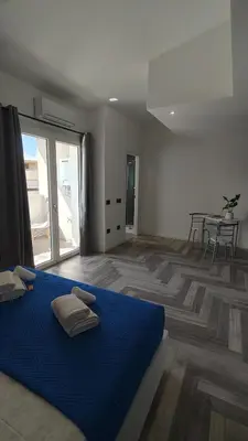 Letto o letti in una camera di Stanza idromassaggio 1