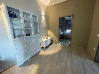 Letto o letti in una camera di APPARTAMENTO ELEGANTE CARBONIA