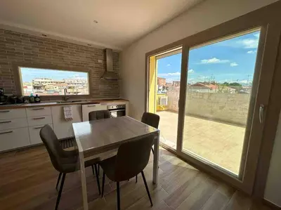 Cucina o angolo cottura di Attico con terrazza a Cagliari.