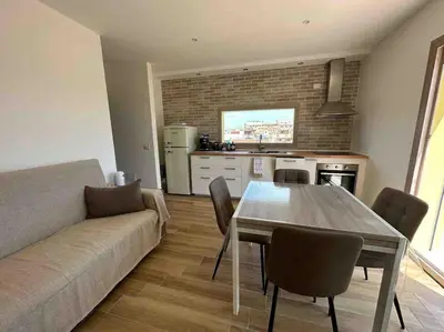 Cucina o angolo cottura di Attico con terrazza a Cagliari.