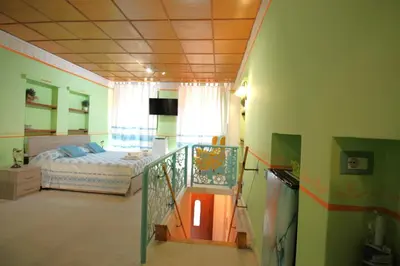 Letto o letti in una camera di La piccola Stampace Cagliari