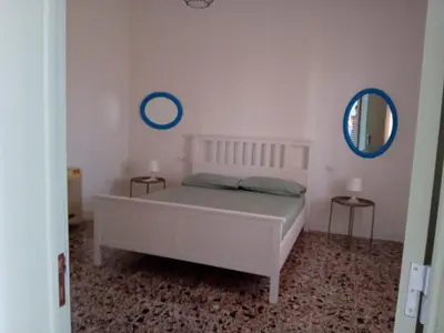 Letto o letti in una camera di Domu Marietta