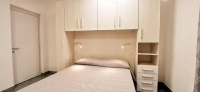 Letto o letti in una camera di Bilocale Gemma