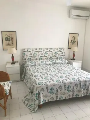 Letto o letti in una camera di Villa Degli Olivi