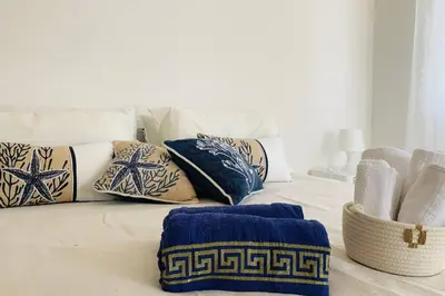 Letto o letti in una camera di Seven House Poetto