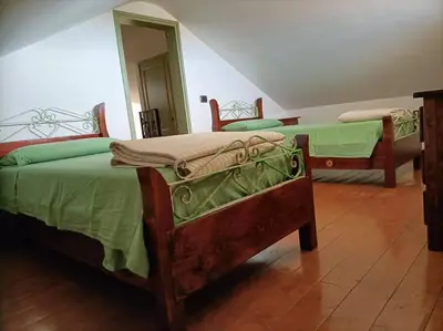 Letto o letti in una camera di Un passo dal mare e dalla città.