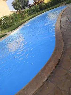 Piscina di Villa Juniperus Porto Pino o nelle vicinanze