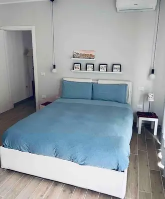 Letto o letti in una camera di Cozy and warm Flat in Villanova - Cagliari