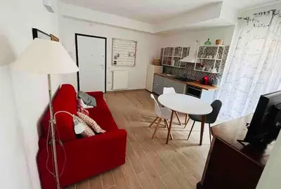 Area soggiorno di Cozy and warm Flat in Villanova - Cagliari