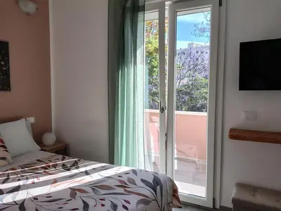 Letto o letti in una camera di Stasonis