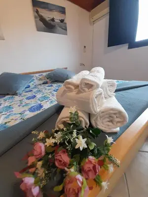 Letto o letti in una camera di Casa Giola