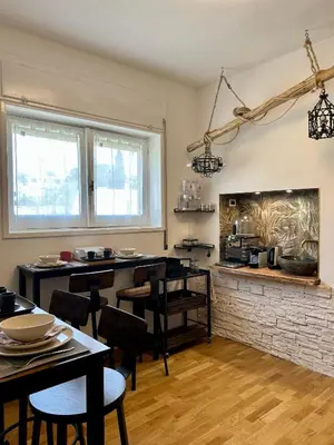 Cucina o angolo cottura di Bed and Breakfast Onde Beach Poetto