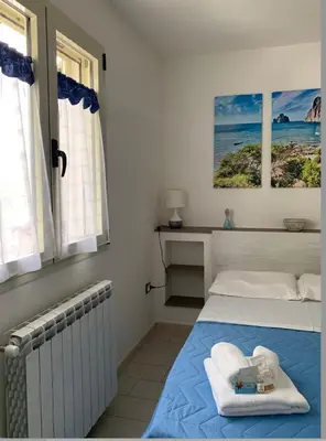 Letto o letti in una camera di La Girandola
