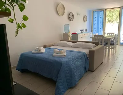 Letto o letti in una camera di La Girandola