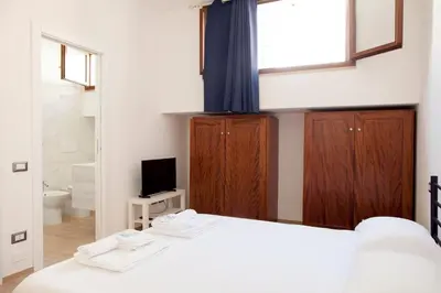 Letto o letti in una camera di Piscina Condominiale 10 Min dal Mare