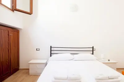 Letto o letti in una camera di Piscina Condominiale 10 Min dal Mare