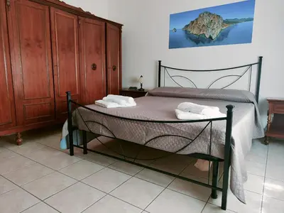 Letto o letti in una camera di Casa Elce