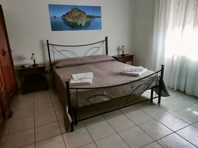 Letto o letti in una camera di Casa Elce