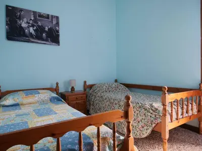 Letto o letti in una camera di Casa vacanze BellaVista