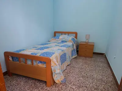 Letto o letti in una camera di Casa vacanze BellaVista