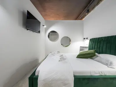 Letto o letti in una camera di Ex Magazzini