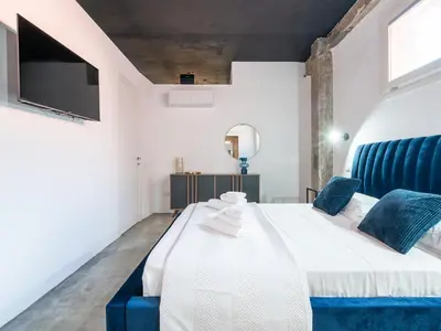 Letto o letti in una camera di Ex Magazzini