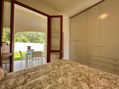 Letto o letti in una camera di Villetta a schiera - Villasimius