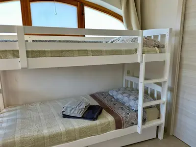 Letto o letti in una camera di Villetta a schiera - Villasimius